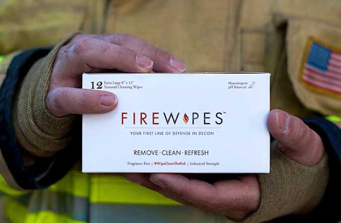 fire wipes box held by firefighter